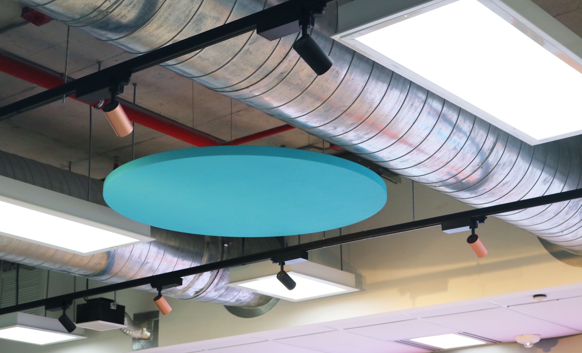 Acoustic ceiling clouds circle shape.